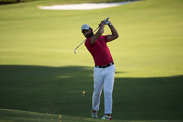 Image showing golf player hitting long shot