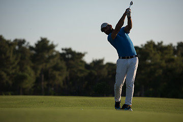 Image showing golfer hitting long shot