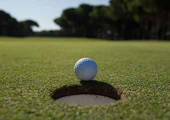 Image showing golf ball in the hole