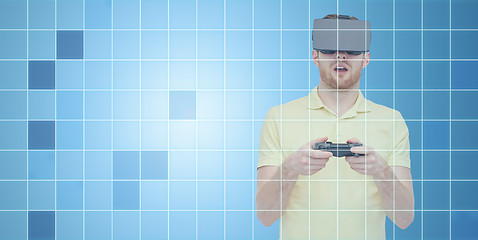 Image showing man in virtual reality headset with gamepad