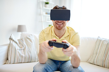 Image showing man in virtual reality headset with controller