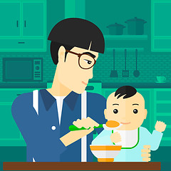 Image showing Man feeding baby.