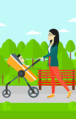 Image showing Woman pushing pram.