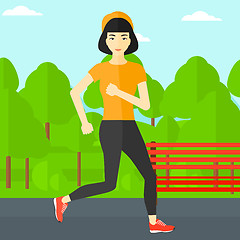 Image showing Sportive woman jogging.