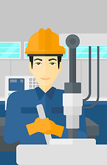 Image showing Man working with industrial equipment.