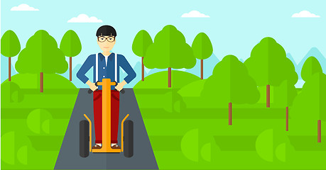 Image showing Man riding on electric scooter.