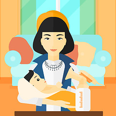 Image showing Woman with breast pump.