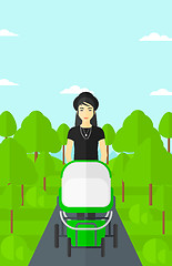 Image showing Woman pushing pram.