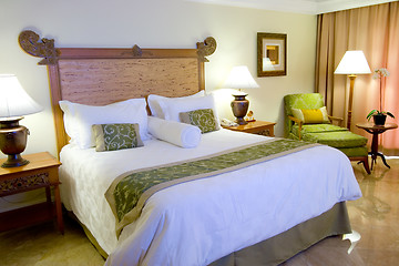 Image showing King sized bed in a hotel suite room

