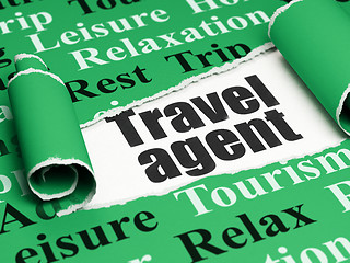 Image showing Vacation concept: black text Travel Agent under the piece of  torn paper