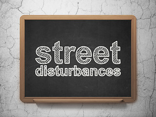 Image showing Political concept: Street Disturbances on chalkboard background