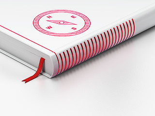 Image showing Tourism concept: closed book, Compass on white background