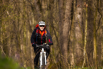 Image showing Mountain Bike cyclist riding single track