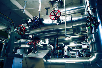 Image showing Equipment, cables and piping as found inside of a modern industr