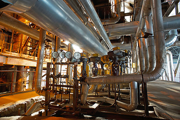 Image showing Equipment, cables and piping as found inside of a modern industr