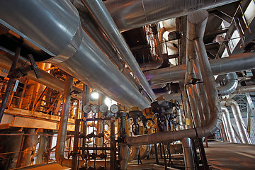 Image showing Equipment, cables and piping as found inside of a modern industr