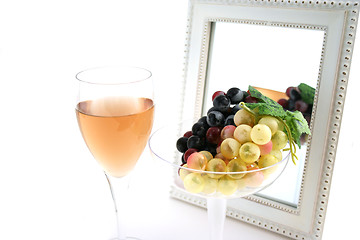 Image showing Isolated Grapes In a Glass