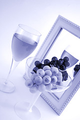 Image showing Isolated Grapes In a Glass