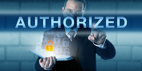 Image showing Business Person Touching AUTHORIZED