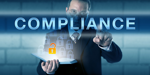 Image showing Businessman Touching COMPLIANCE