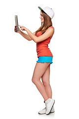 Image showing Full length sporty female with digital tablet