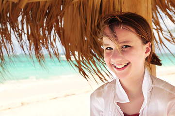 Image showing Young girl on tropical beach