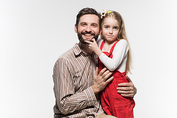 Image showing Girl hugging her father  over a white background