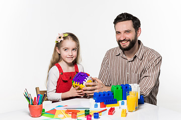 Image showing Father and daughter playing educational games together 