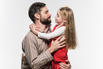 Image showing Girl hugging her father  over a white background