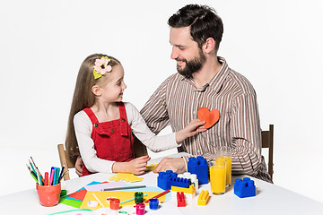 Image showing Father and daughter playing educational games together 