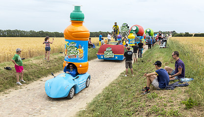 Image showing Teisseire Caravan on a Cobblestone Road- Tour de France 2015