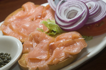 Image showing bagel breakfast  smoked salmon capers red onions 