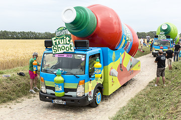 Image showing Teisseire Caravan on a Cobblestone Road- Tour de France 2015