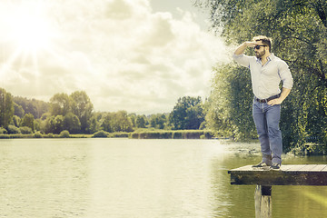 Image showing watching man at the lake