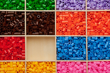 Image showing Colorful plastic beads background