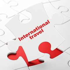 Image showing Travel concept: International Travel on puzzle background