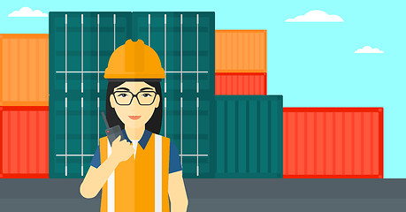 Image showing Stevedore standing on cargo containers background.