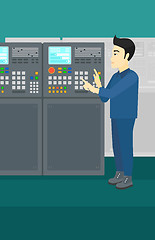 Image showing Engineer standing near control panel.
