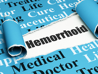 Image showing Health concept: black text Hemorrhoid under the piece of  torn paper