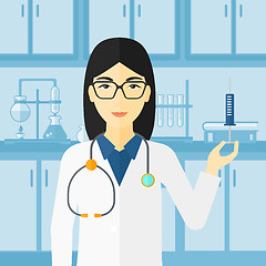 Image showing Doctor with syringe in laboratory.