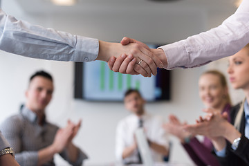 Image showing business womans handshake