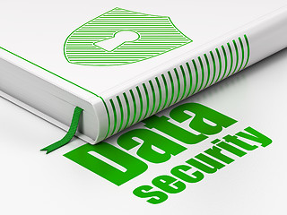 Image showing Privacy concept: book Shield With Keyhole, Data Security on white background