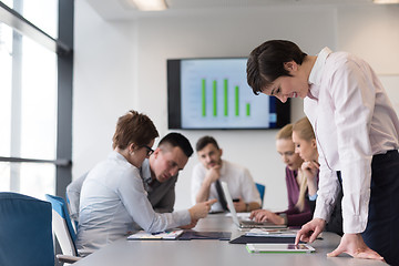 Image showing young  woman using  tablet on business meeting