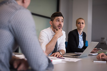 Image showing business people group on meeting at modern startup office