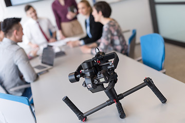 Image showing young business people group on meeting at modern office