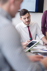 Image showing young business people group on meeting at modern office