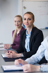 Image showing young business people group on team meeting at modern office