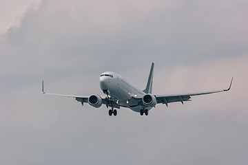 Image showing Airplane in the sky. Holiday travel transportation concept.