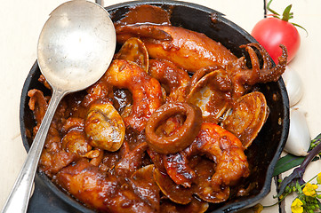 Image showing fresh seafoos stew on an iron skillet