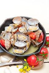 Image showing fresh clams on an iron skillet